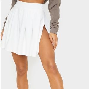 White pleated tennis skirt